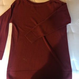 Red 3/4 length sleeve sweater.